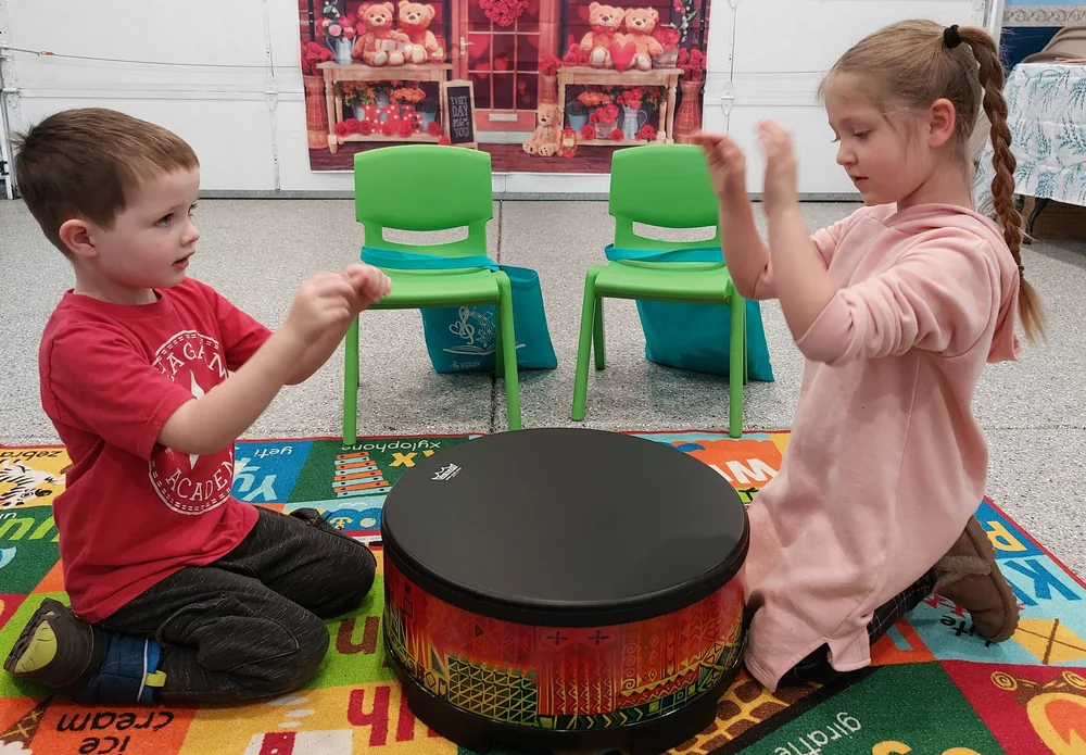 Students working out a rhythm together